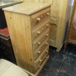 A pine chest of six drawers