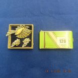 An art deco brooch and matching earrings set with marcasite and art deco enamel compact