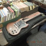 A cased Gibson model 2016 electric guitar
