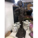 A bronze girl with basket