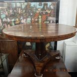 A 19th century rosewood breakfast table