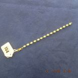 A 9ct gold and opal line bracelet