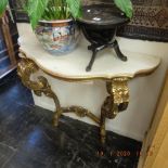 A gilt consul table with marble top