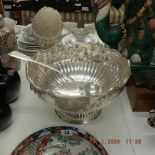 A silver plated punch bowl and ladle