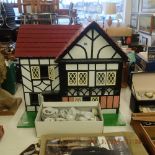 A dolls house and contents