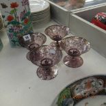 Four silver overlay amethyst glass coupes