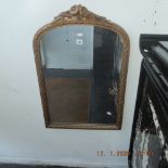 A gilt framed mirror