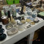 A mixed assortment of sundries including porcelain and metalware