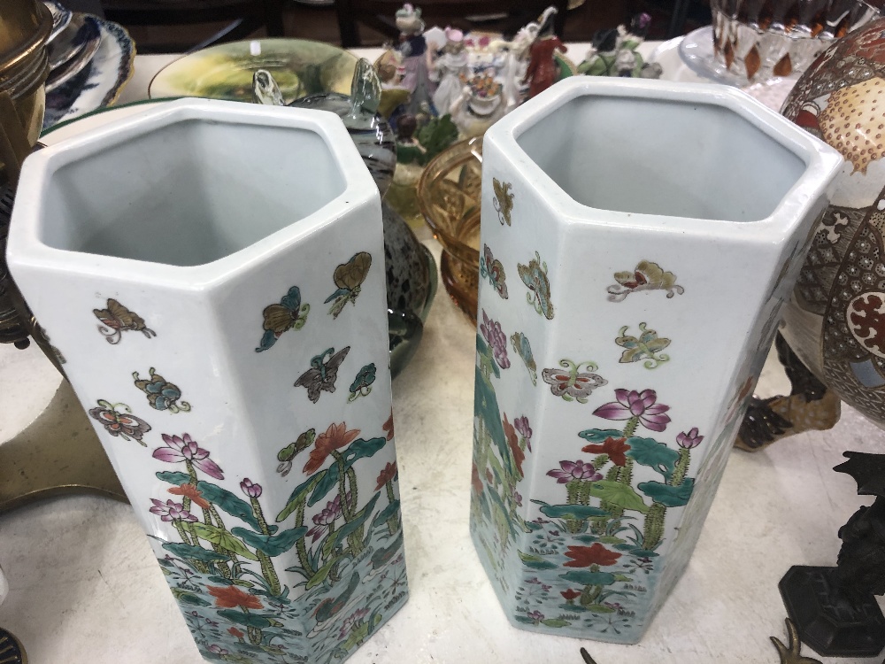 A pair of hexagonal oriental vases