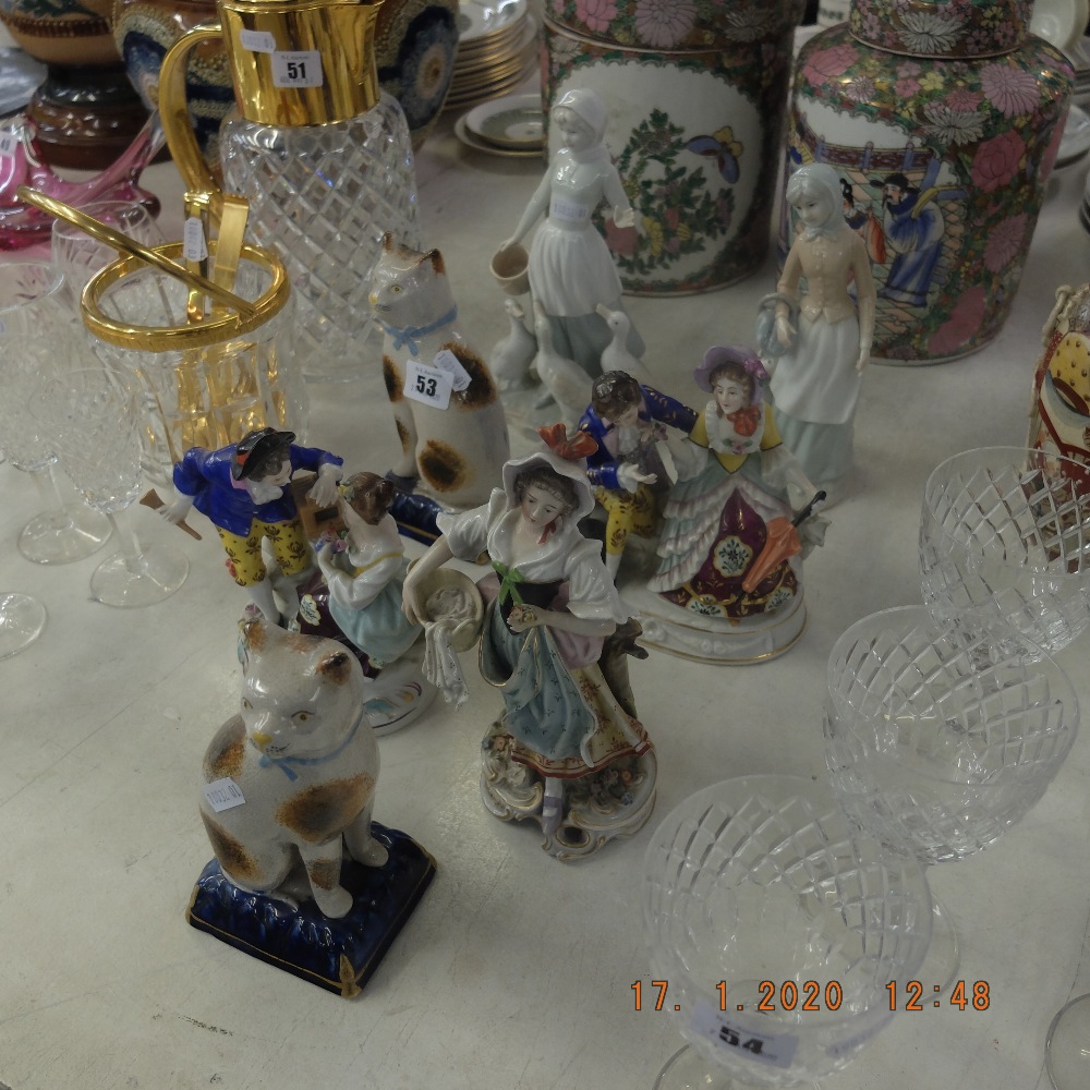 A quantity of assorted figures including Lladro