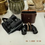 Two cased binoculars