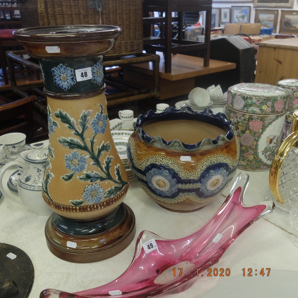 A Doulton Lambeth Jardiniere and stand (slight damage to slip ware applied decoration)