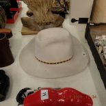 A cowboy hat with matches,