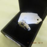 A 14ct white gold and diamond ring,