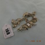 An early hm silver charm bracelet with 21 assorted very fine charms,