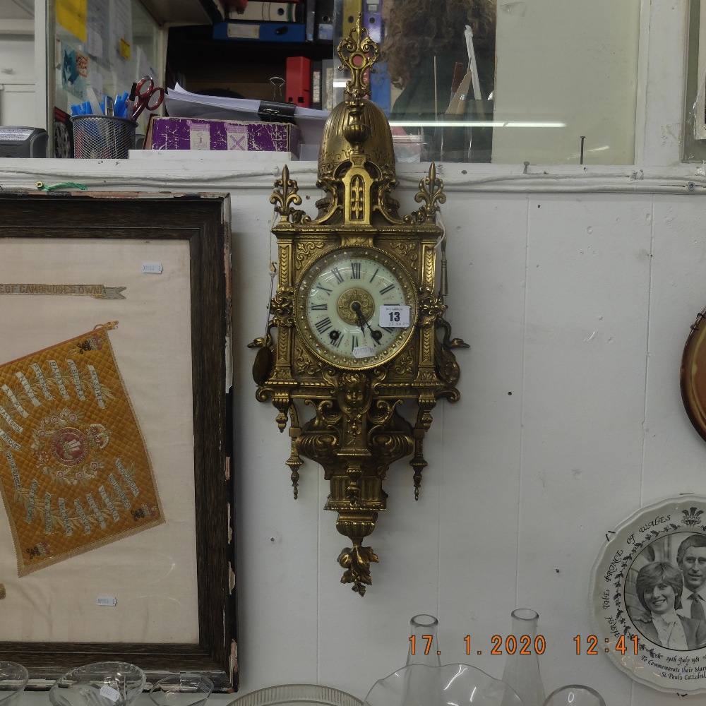 A French gilt brass wall clock circa 1900