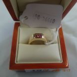 An 18ct gold and pink sapphire ring