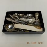 A quantity of assorted cutlery and other metalware including some silver