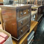 A mahogany chest of drawers