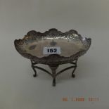 A late Victorian hallmarked silver dish on detachable pedestal base i n the form of a centrepiece,