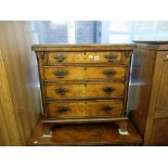 A mahogany bachelors chest of four drawers