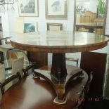 A 19th century rosewood breakfast table