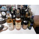 Twenty two bottles of assorted wines and spirits including two bottles of whisky