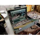 A vintage cased Viking Husqvarna sewing machine