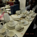 Two part gold and white porcelain sets,