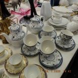 A Royal Doulton Cambridge blue and white tea and coffee service