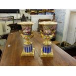 A pair of fine quality 19th century hand painted porcelain twin handled vases in form of urns,