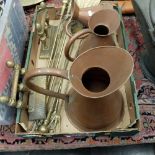 A quantity of items of copper and brass ware including three copper jugs