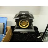 A good quality slate mantle clock with key and pendulum