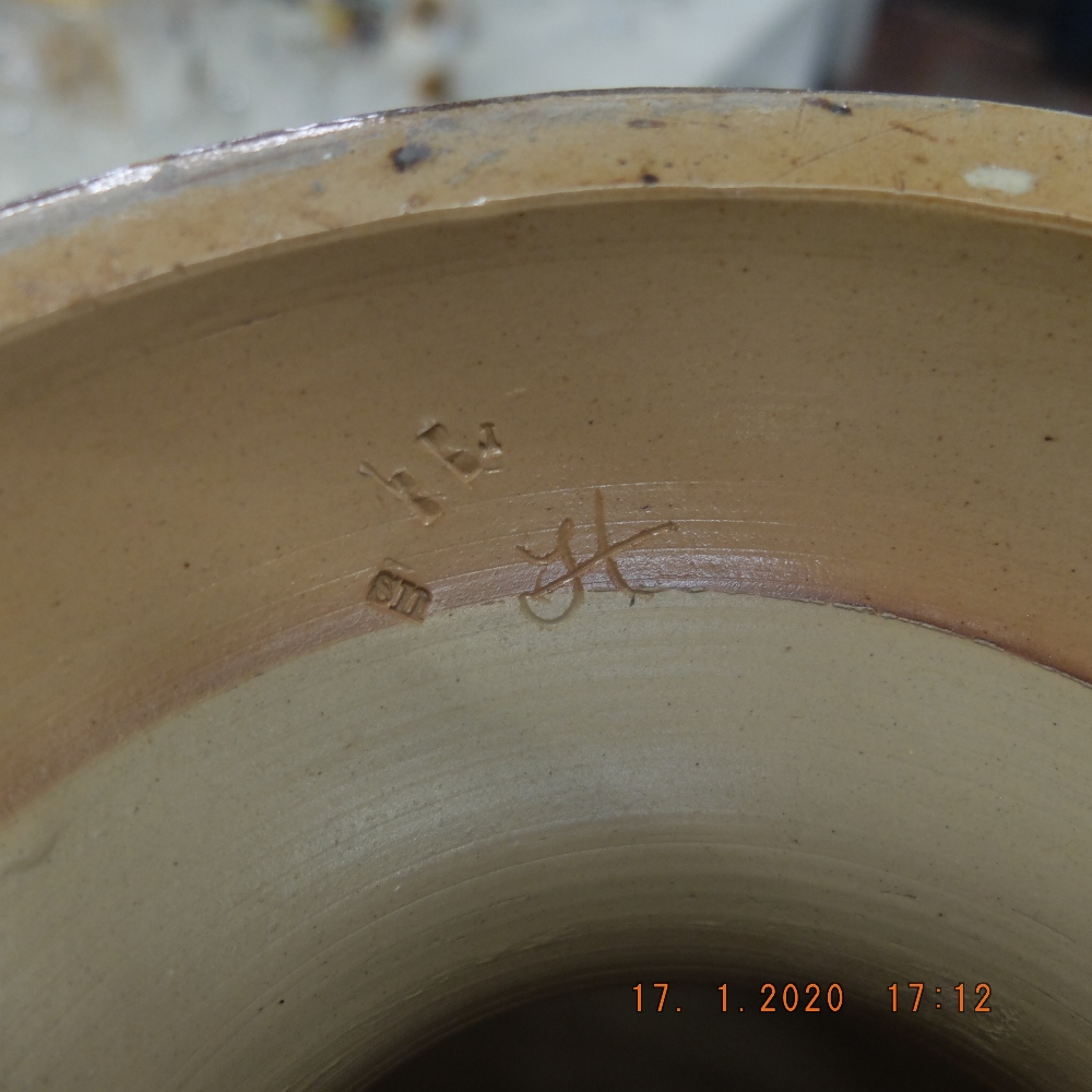 A Doulton Lambeth Jardiniere and stand (slight damage to slip ware applied decoration)