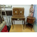 An antique continental walnut ladies desk with ormolu mounts and Limoges plaques width 76cm height
