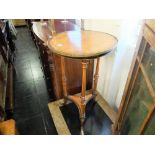 A circular French empire style brass inlaid satinwood two tier occasional table a/f