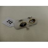 A pair of yellow and white gold diamond set cufflink's,