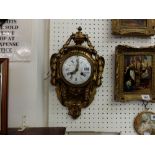 A fine quality 19th century French ormolu cartel wall clock with porcelain dial marked Raingo