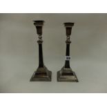 A pair of hallmarked silver candlesticks, London 1956 A Taite & Sons,