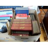 A box of assorted hardback books