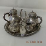 A German 800 silver five piece tea & coffee set comprising a coffee pot, tea pot, lidded sugar bowl,