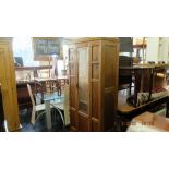 An oak wardrobe and matching dressing table