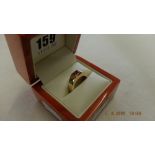 An 18ct gold Cartier ring set with pink sapphire