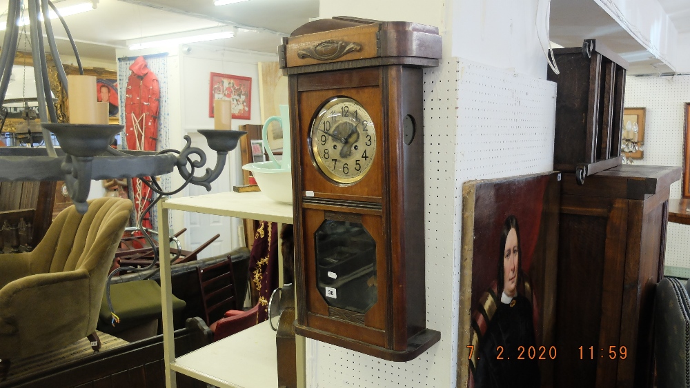 A mahogany wall clock