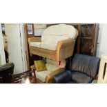 A rattan sofa and armchair