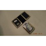 A miniature silver photo frame and double photo frame