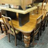 A 19th century extending table with three leaves