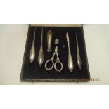 A boxed hallmarked silver sewing set