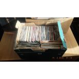 A box of assorted 150 singles including Beatles, 70s, 80s,