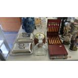 An assortment of oddments including silver plate and glassware
